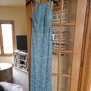 Light blue Sherri Hill beaded gown.